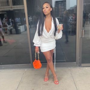 Mistress rocks white dress